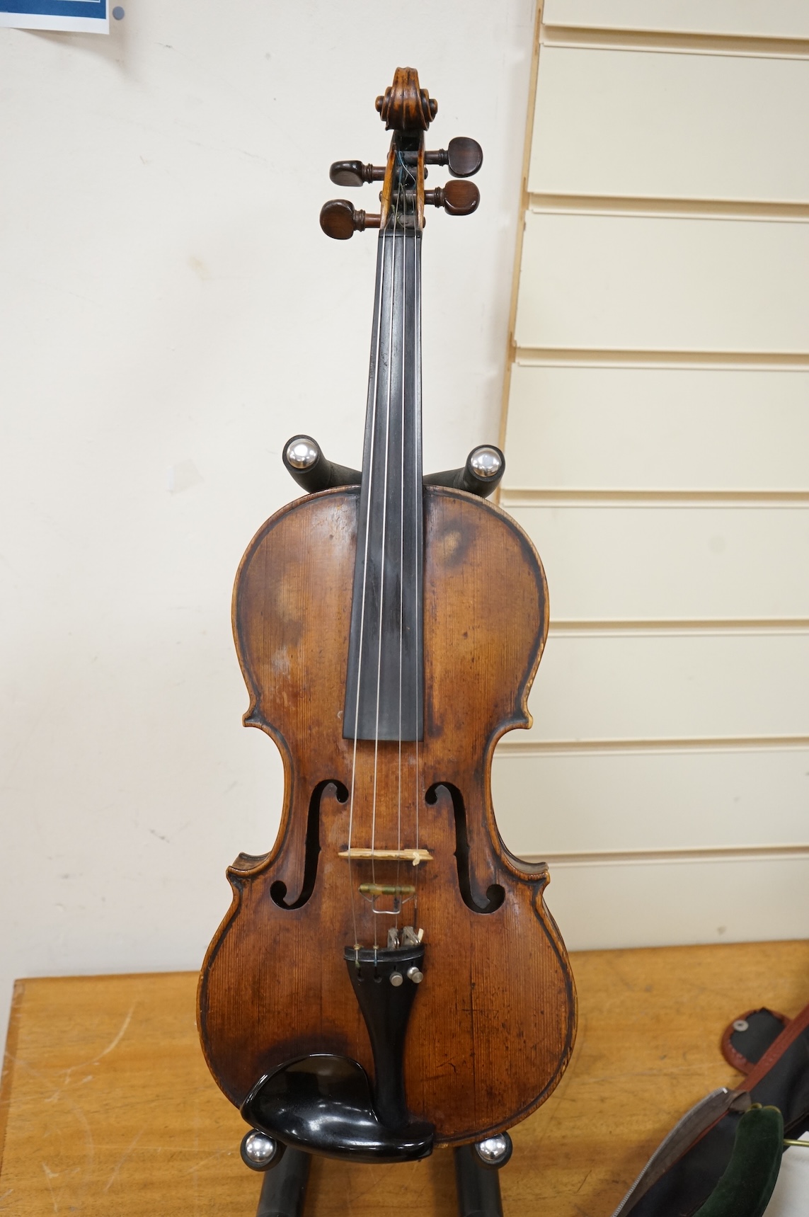 An interesting late 18th century violin, with one piece bird’s eye maple back, unsigned, with two silver fully mounted octagonal bows, one stamped Voight CITES Submission reference, 3XFNUBT7 and Submission reference, RHL